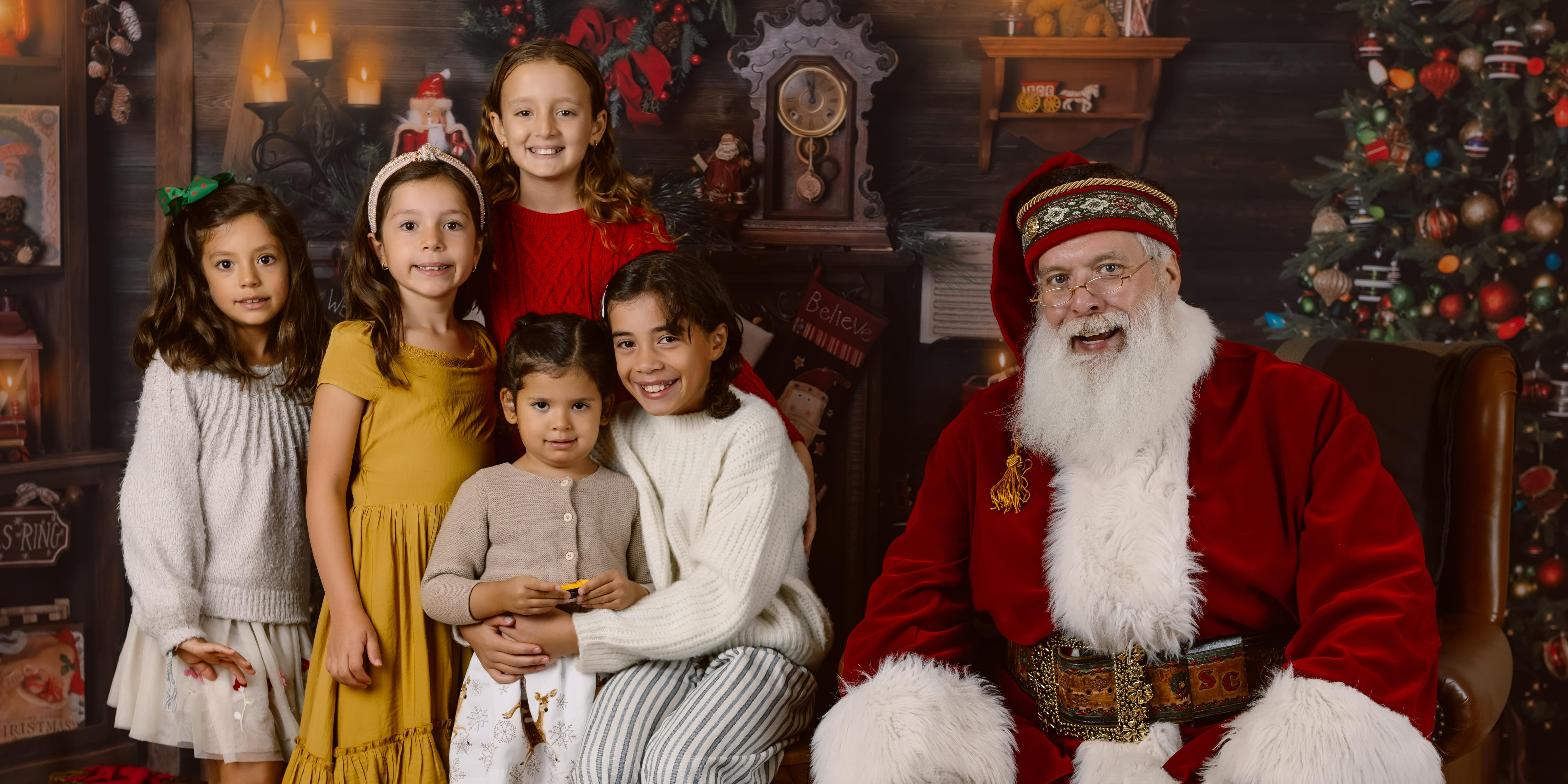 Santa's Warm Embrace Family Photos Brimming with Holiday Spirit — free download